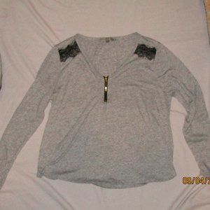 Women's knit zip front top with lace